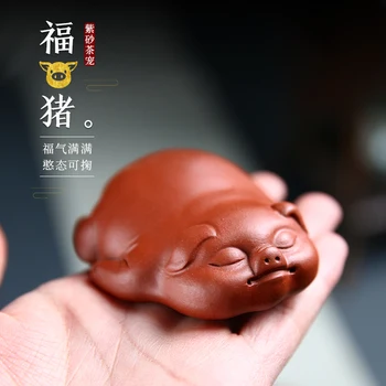 tea pet furnishing articles manually play tea accessories zhu mud lie prone to lie prone pig pig a single price 
tea pet furnishing articles manually play tea accessories zhu mud lie prone to lie prone pig pig a single price