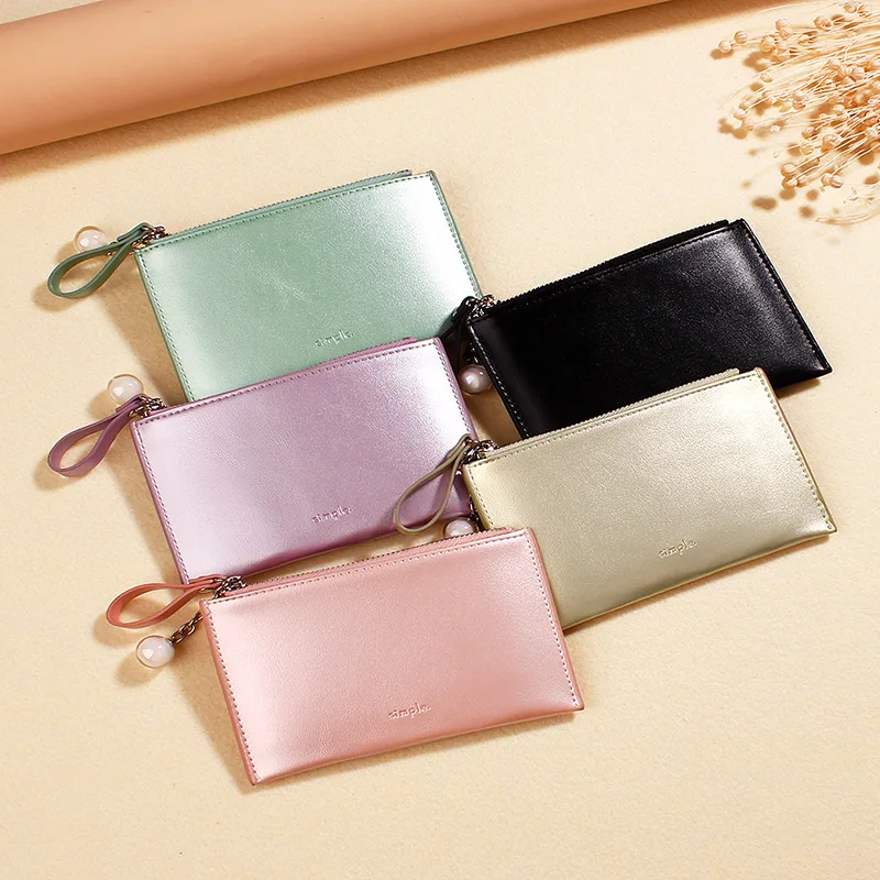 Korean version of the multi-functional mini zipper hand bag small pearly bright face creative coin zero wallet candy-colored
Korean version of the multi-functional mini zipper hand bag small pearly bright face creative coin zero wallet candy-colored