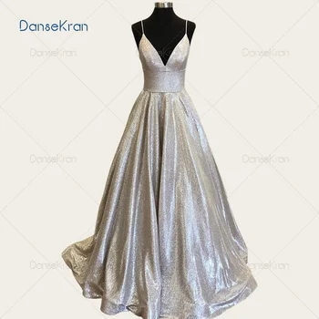 V-Neck Champagne Sparkly Prom Dresses 2021 Spaghetti Straps A-Line Evening Dress Zipper Up Backless Formal Party Gowns
V-Neck Champagne Sparkly Prom Dresses 2021 Spaghetti Straps A-Line Evening Dress Zipper Up Backless Formal Party Gowns
