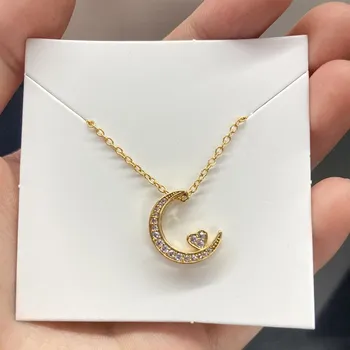 Classic Rhinestone Moon Heart Shaped Hollow Women Elegant Pendant Necklace Stainless Steel Sweater Chain Fashion Accessories
Classic Rhinestone Moon Heart Shaped Hollow Women Elegant Pendant Necklace Stainless Steel Sweater Chain Fashion Accessories