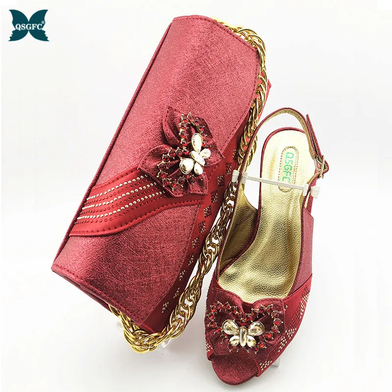 Фото Женский комплект из обуви и сумки красного цвета в нигерийском стиле элегантные