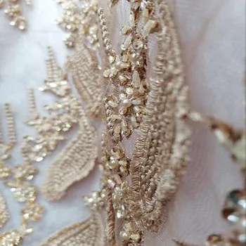 Gold fabric embroidery beads sequins French mesh yarn lace Kenya African lace fabric high-end dress evening dress design Fabric
Gold fabric embroidery beads sequins French mesh yarn lace Kenya African lace fabric high-end dress evening dress design Fabric