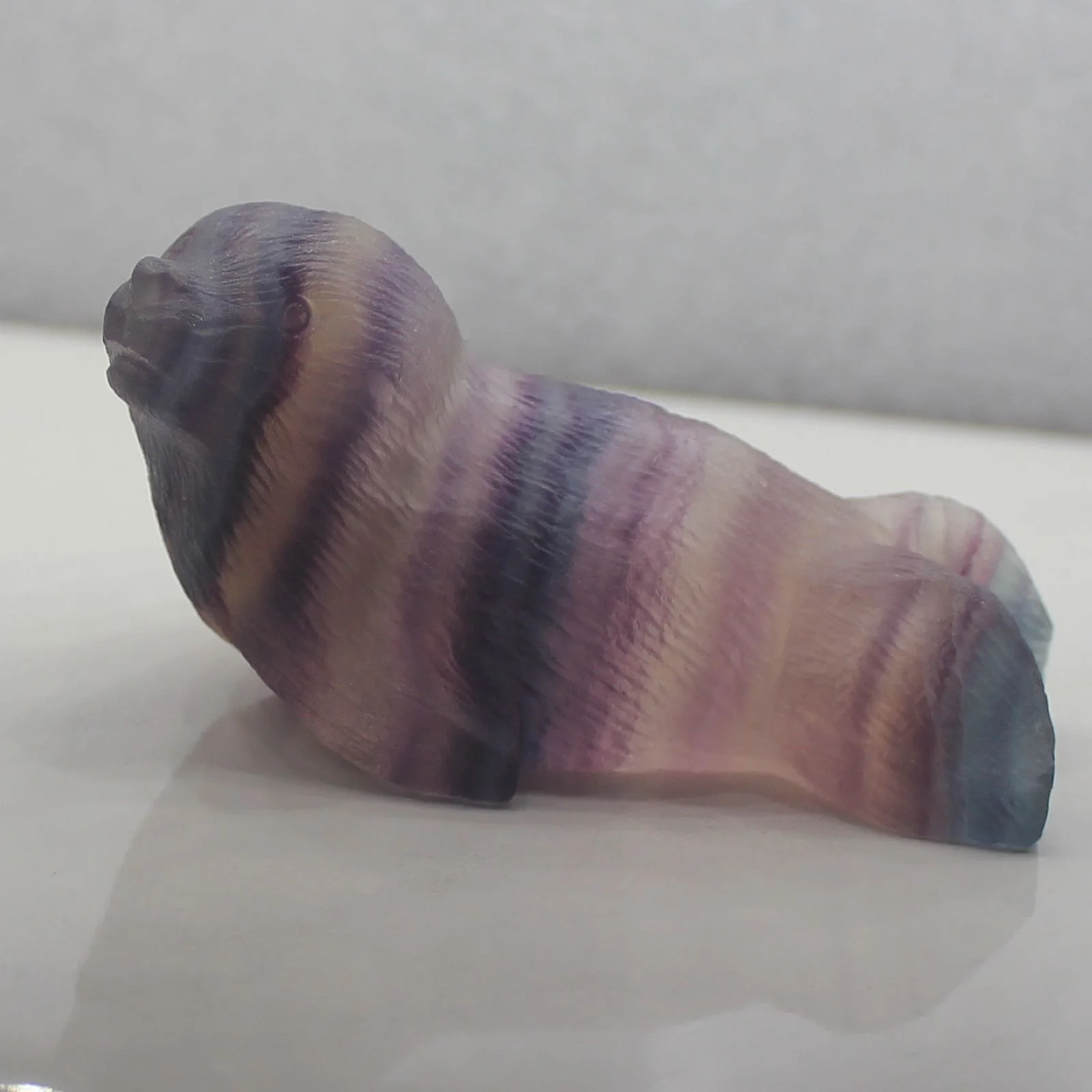 Hand carved gemstone rainbow fluorite crystal sea lion animal figurine animal carving
Hand carved gemstone rainbow fluorite crystal sea lion animal figurine animal carving