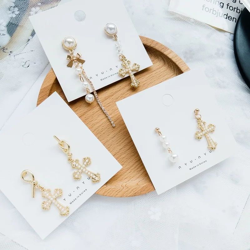 Korean Simple Temperament Imitation Pearl Alloy Cross Asymmetry Earrings Fashion Personality Girl Women's Jewelry Accessories 
Korean Simple Temperament Imitation Pearl Alloy Cross Asymmetry Earrings Fashion Personality Girl Women's Jewelry Accessories