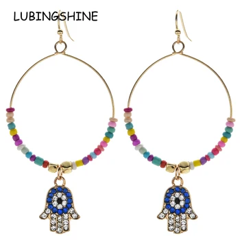 12pairs/lot Bohemian Gold Color Seed Bead Evil Eye Drop Earrings for Women Round Big Fatima Hand Dangle Earrings Fashion Jewelry
12pairs/lot Bohemian Gold Color Seed Bead Evil Eye Drop Earrings for Women Round Big Fatima Hand Dangle Earrings Fashion Jewelry