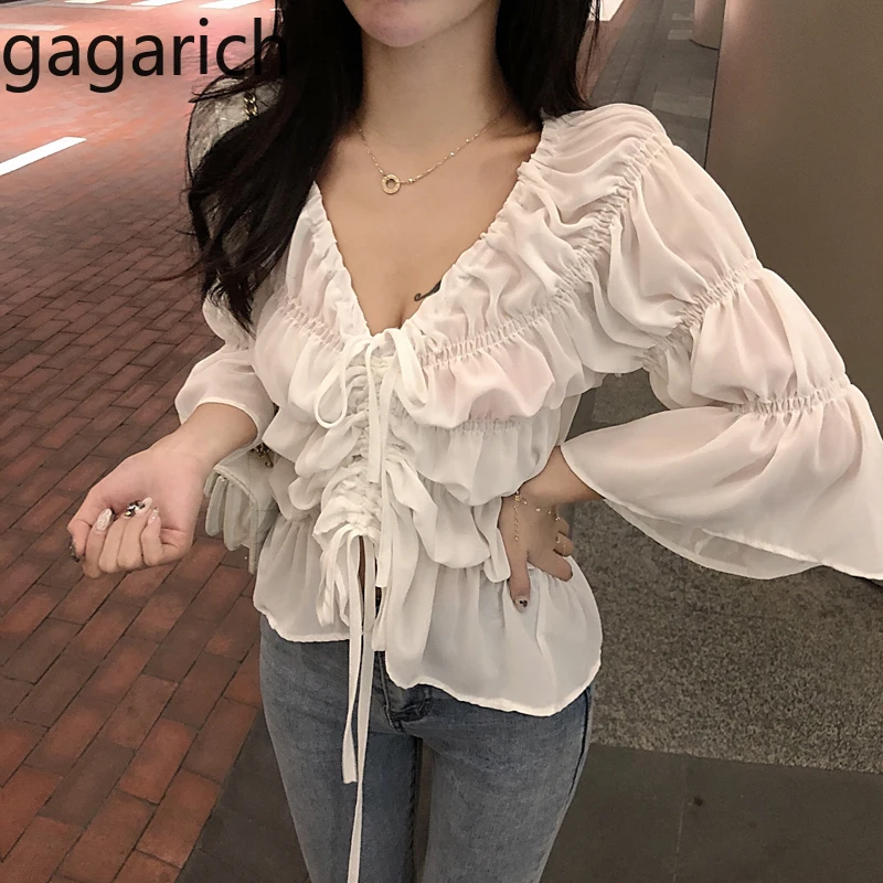 Gagarich Women Short Chiffon Tops Hong Kong Chic Sexy V Neck Pleated Lace Up Solid Blouse Femme Summer Half Sleeve Shirt Elegant
Gagarich Women Short Chiffon Tops Hong Kong Chic Sexy V Neck Pleated Lace Up Solid Blouse Femme Summer Half Sleeve Shirt Elegant