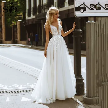 Ivory Boho Wedding Dress Sexy Backless V-Neck Appliques Lace Tulle Beach Bridal Dress Simple Wedding Gowns plus size
Ivory Boho Wedding Dress Sexy Backless V-Neck Appliques Lace Tulle Beach Bridal Dress Simple Wedding Gowns plus size