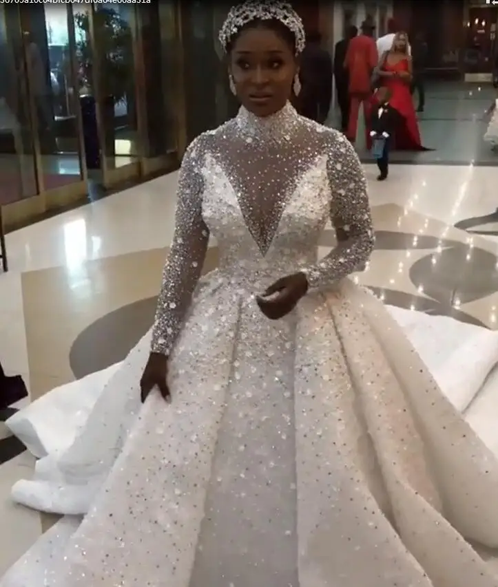 2020 New African Wedding Dresses Ball Gown High Collar Beading Sequins Bridal Dress Long Sleeves Arabic Wedding Gowns
2020 New African Wedding Dresses Ball Gown High Collar Beading Sequins Bridal Dress Long Sleeves Arabic Wedding Gowns