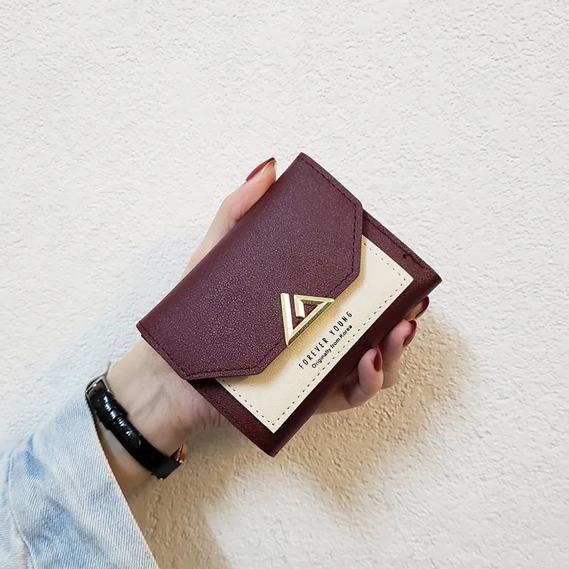 2020 new Small purse Triangle Decoration Woman Wallets Short Women's wallet made of leather Trifold Fashion Women's card holder
2020 new Small purse Triangle Decoration Woman Wallets Short Women's wallet made of leather Trifold Fashion Women's card holder