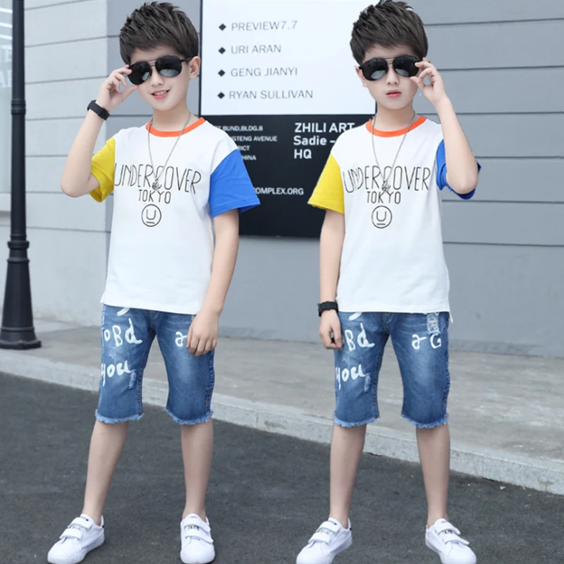 Child' wear boy clothes 2020 summer stitching short-sleeved T-shirt denim shorts 2 pieces sports set 4-11 Quality kids clothing
Child' wear boy clothes 2020 summer stitching short-sleeved T-shirt denim shorts 2 pieces sports set 4-11 Quality kids clothing