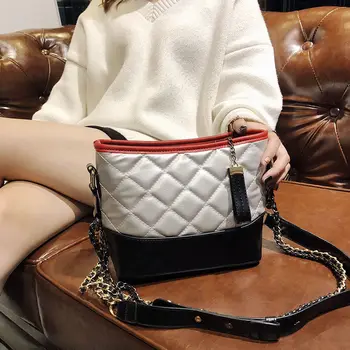 New fashion women bag wild diagonal rhombic chain bucket bag personality female student trend bag 
New fashion women bag wild diagonal rhombic chain bucket bag personality female student trend bag