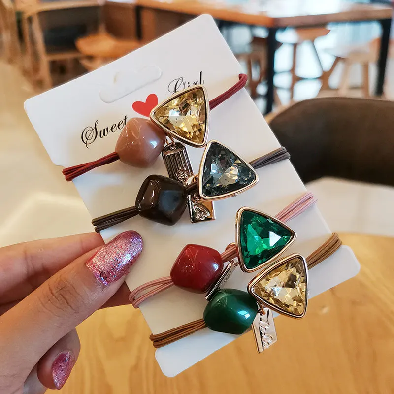 Korean version of small fresh triangle rhinestones ins net red head rope hair loop leather case hair rope hair accessories
Korean version of small fresh triangle rhinestones ins net red head rope hair loop leather case hair rope hair accessories