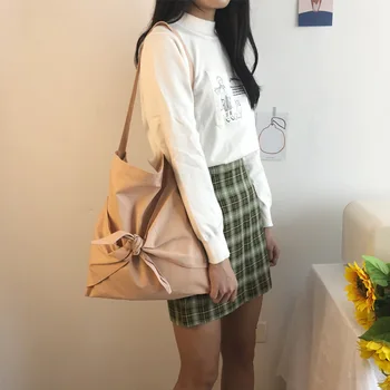 2020 new female bag Korean wild girl heart bow bag college wind bag shoulder canvas bag female
2020 new female bag Korean wild girl heart bow bag college wind bag shoulder canvas bag female