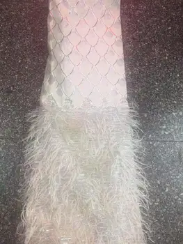 Wholesale French fringed lace fabric with feather high quality handmade African glitter sequined fabric for royal wedding dress
Wholesale French fringed lace fabric with feather high quality handmade African glitter sequined fabric for royal wedding dress