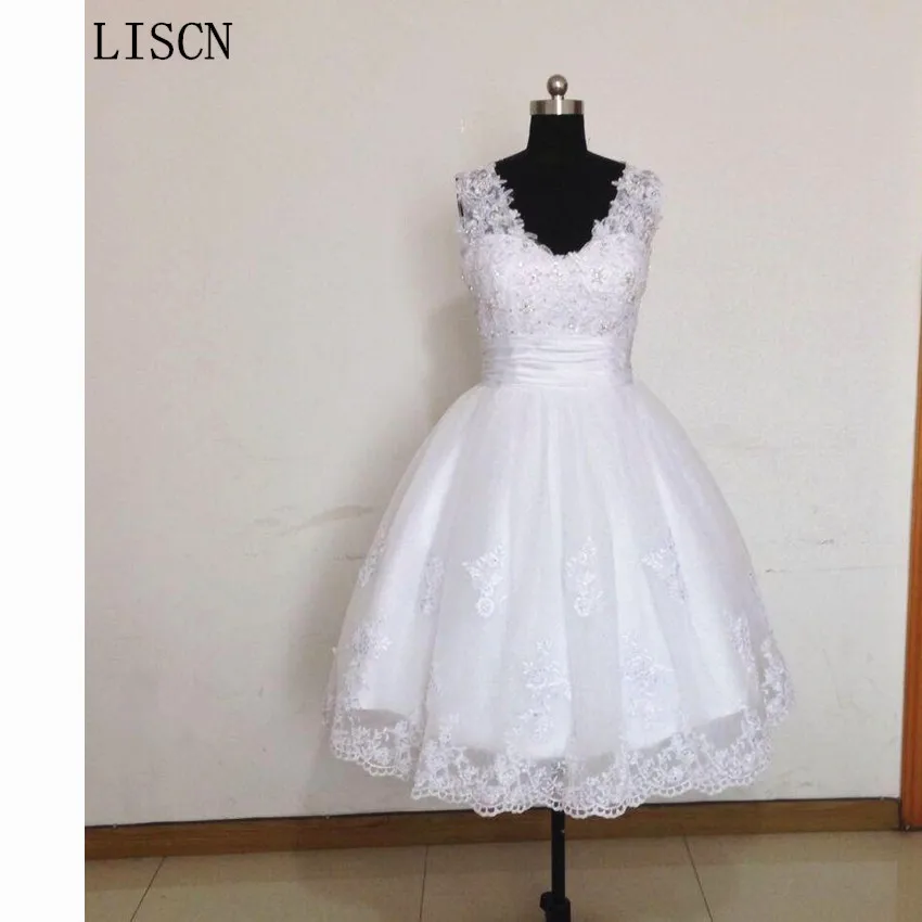 Backless Ruched White Ivory Real Image Tea Length V Neck Short Wedding Dress Applique Wedding Dresses Crystal Beaded Bridal Gown
Backless Ruched White Ivory Real Image Tea Length V Neck Short Wedding Dress Applique Wedding Dresses Crystal Beaded Bridal Gown
