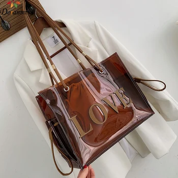 DORANMI Letter Women's Handbag 2020 Summer Transparent Totes Bag Female Shoulder Bags Female Top-handle Bags Bolsos Mujer BG572
DORANMI Letter Women's Handbag 2020 Summer Transparent Totes Bag Female Shoulder Bags Female Top-handle Bags Bolsos Mujer BG572