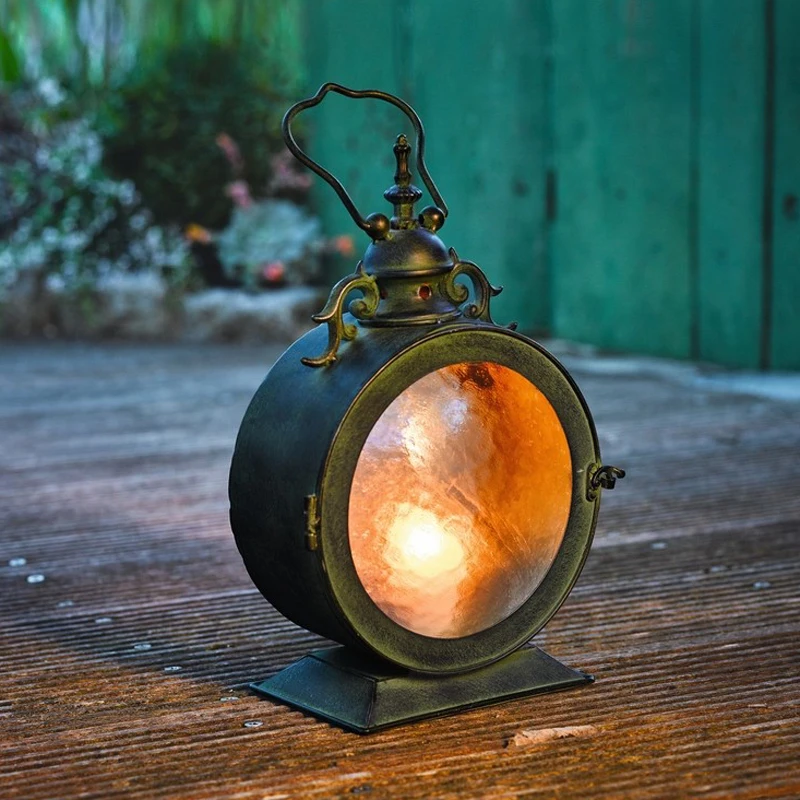 Retro Greyish Green iron candle holders Portable hanging courtyard storm lantern household decoration candlelight ambiance lamp 
Retro Greyish Green iron candle holders Portable hanging courtyard storm lantern household decoration candlelight ambiance lamp