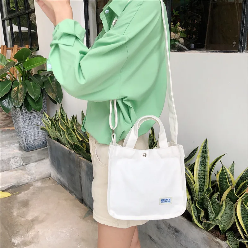 Casual canvas diagonal bag girl solid color wild shoulder bag simple student small square bag 
Casual canvas diagonal bag girl solid color wild shoulder bag simple student small square bag