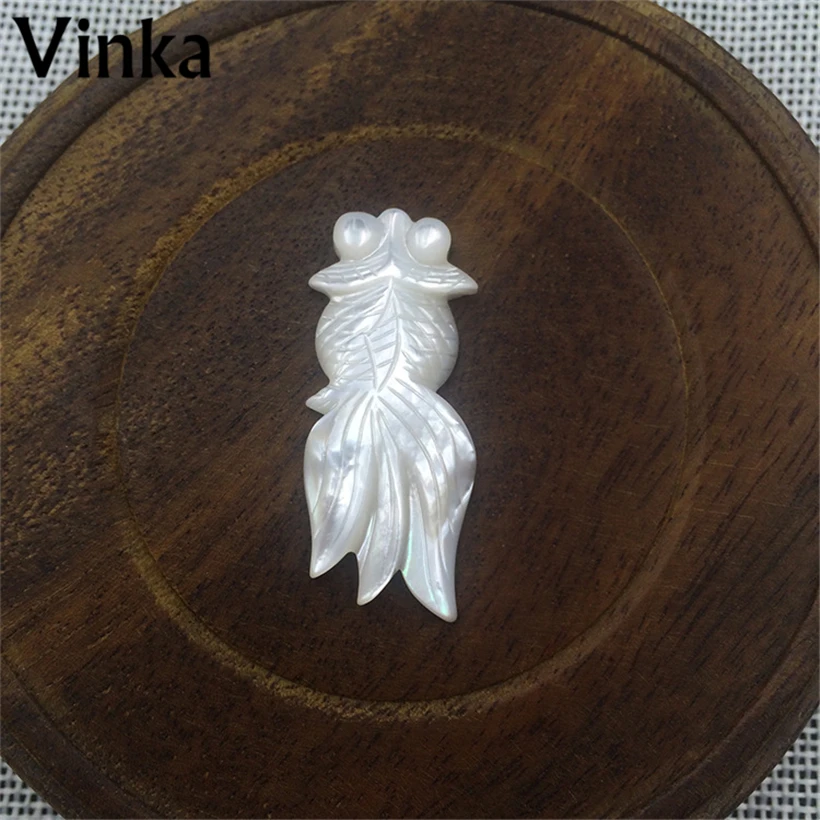 Factory direct natural shell hand-carved goldfish earrings bracelet pendant accessories
Factory direct natural shell hand-carved goldfish earrings bracelet pendant accessories