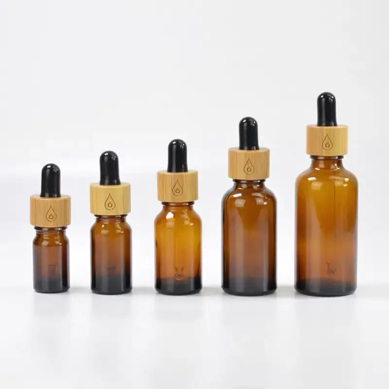 

CBD oil 1oz matte black green blue amber clear essential oil glass dropper bottle with bamboo lid bamboo serum bottle e-liquid