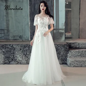 Sexy See Through A-line Wedding Gowns With Sweep Train Elegant Scoop Neck Lace Appliques Floor-length White Tulle Bridal Dresses
Sexy See Through A-line Wedding Gowns With Sweep Train Elegant Scoop Neck Lace Appliques Floor-length White Tulle Bridal Dresses