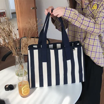 Fashion 2020 new simple one-shoulder Messenger temperament cross-body bag wild canvas portable large capacity female stripe bag
Fashion 2020 new simple one-shoulder Messenger temperament cross-body bag wild canvas portable large capacity female stripe bag