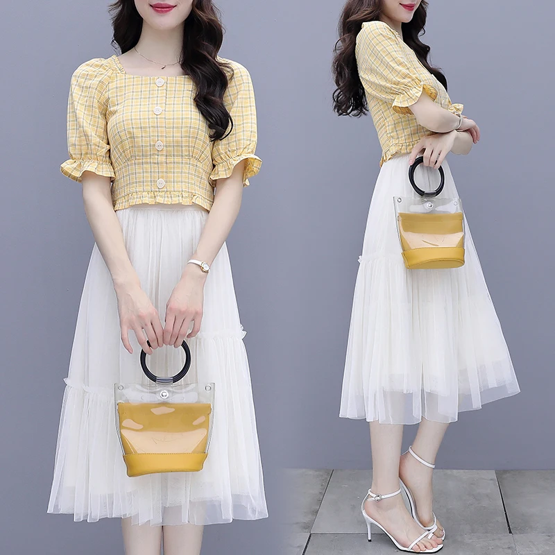 Женский костюм с юбкой и высокой талией, комплект из 2 предметов, платье с коротким рукавом и юбка в клетку, пуловер и топ, лето 2021
Женский костюм с юбкой и высокой талией, комплект из 2 предметов, платье с коротким рукавом и юбка в клетку, пуловер и топ, лето 2021