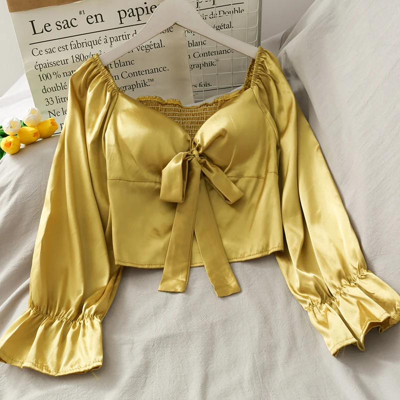 Bow tie lace short shirt female design sense niche 2020 new Korean version of the trumpet sleeves topless back
Bow tie lace short shirt female design sense niche 2020 new Korean version of the trumpet sleeves topless back