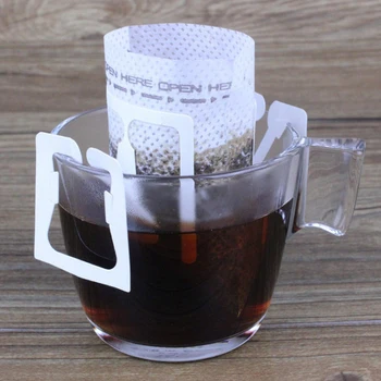 50Pcs Coffee Filters Paper Disposable Home Office DIY Drip Coffee Capsule Filter Bag Hanging style Brew Tea Tools Coffee Dripper
50Pcs Coffee Filters Paper Disposable Home Office DIY Drip Coffee Capsule Filter Bag Hanging style Brew Tea Tools Coffee Dripper
