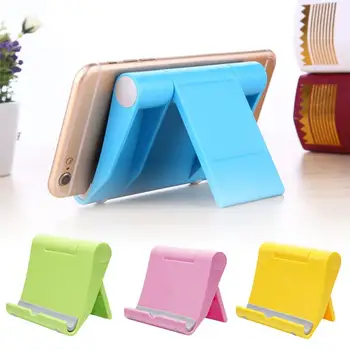 Mini Phone Holder Folding Stand for iPhone X Tablet Adjustable Holder for Smartphone Мини телефон держатель рабочего стола
Mini Phone Holder Folding Stand for iPhone X Tablet Adjustable Holder for Smartphone Мини телефон держатель рабочего стола