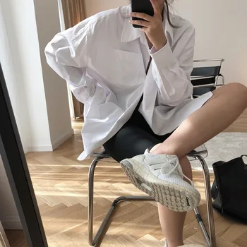 Louvre early autumn new Korean design sense oversize Lapel white shirt loose asymmetric boyfriend top female 
Louvre early autumn new Korean design sense oversize Lapel white shirt loose asymmetric boyfriend top female
