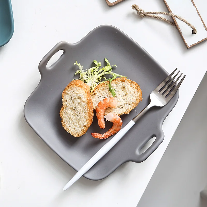 New Japanese matte glazed ceramic plate Household dishes Ear small rectangular plate Solid color pasta ins tableware
New Japanese matte glazed ceramic plate Household dishes Ear small rectangular plate Solid color pasta ins tableware