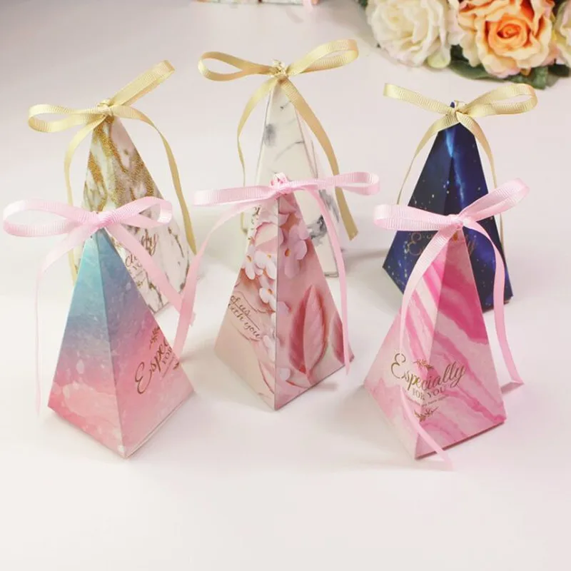 New DIY beautiful 10pcs High end Triangular Pyramid Chocolate Packaging Box Wedding Dragees Box Gift Boxes for Events 2019
New DIY beautiful 10pcs High end Triangular Pyramid Chocolate Packaging Box Wedding Dragees Box Gift Boxes for Events 2019