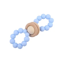 Multi-color Soft Silicone Beaded Wooden Ring Toy Hollow Character Design Easy To Grasp, Safe and Durable Silicone Teether
Multi-color Soft Silicone Beaded Wooden Ring Toy Hollow Character Design Easy To Grasp, Safe and Durable Silicone Teether