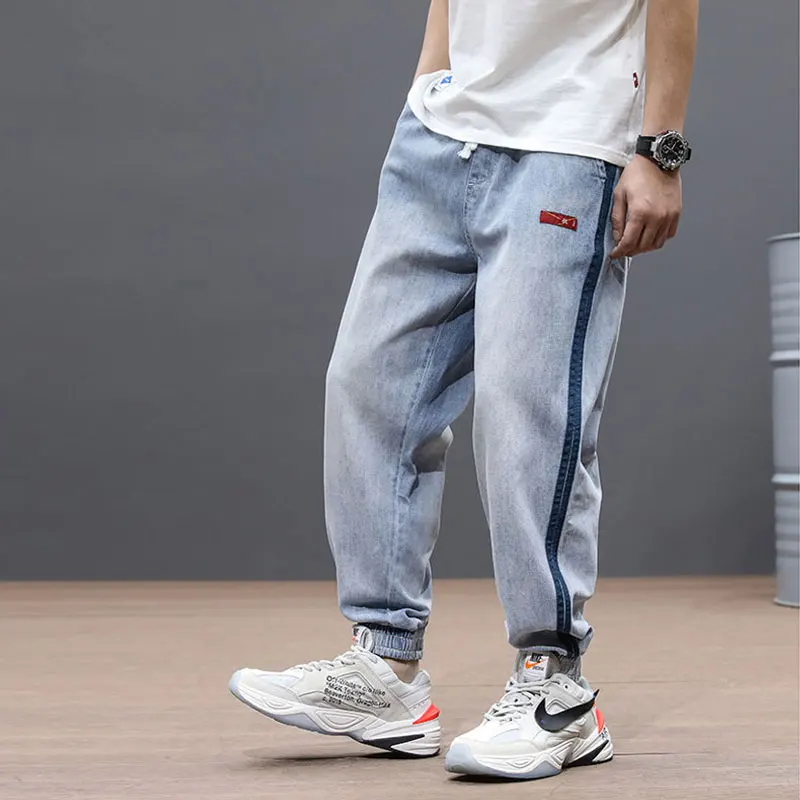 Japanese Fashion Men Jeans Loose Fit Stripe Designer Light Blue Denim Harem Pants Slack Bottom Wide Leg Hip Hop Jeans Men Jogger
Japanese Fashion Men Jeans Loose Fit Stripe Designer Light Blue Denim Harem Pants Slack Bottom Wide Leg Hip Hop Jeans Men Jogger