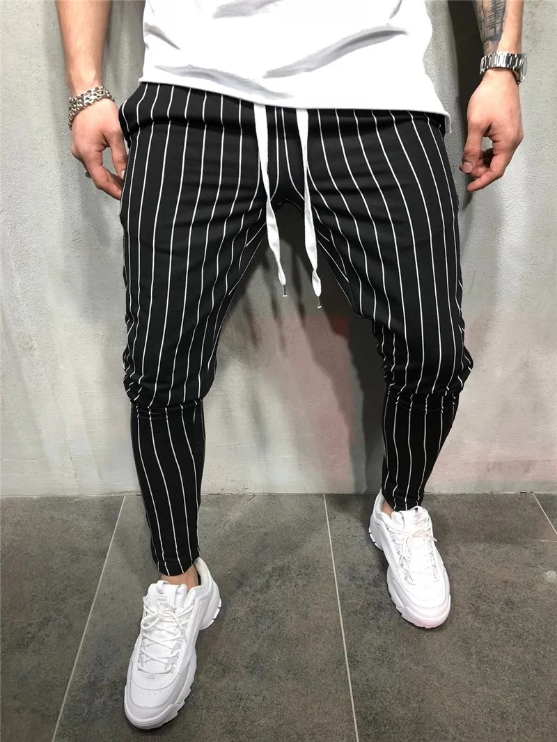 High quality men's Korean version checked fashion patchwork color matching small legs trouser slim casual sports pencil pants
High quality men's Korean version checked fashion patchwork color matching small legs trouser slim casual sports pencil pants