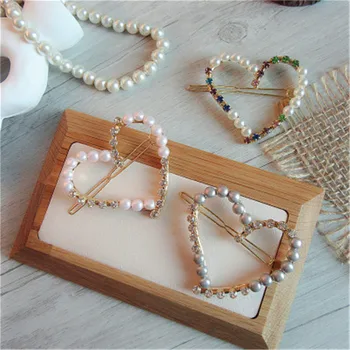 New Korea Retro Love Heart Shape Rhinestone Pearl Hair Clips Adult Side Clip Frog Clip Bangs Hairpins Female Hair Accessories
New Korea Retro Love Heart Shape Rhinestone Pearl Hair Clips Adult Side Clip Frog Clip Bangs Hairpins Female Hair Accessories