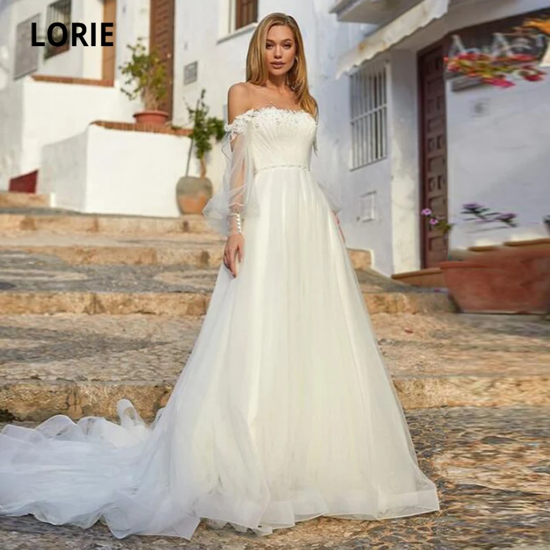 LORIE Gorgerous Wedding Dresses O-Neck Appliques Lace Long Sleeves Button Back Tulle A-Line Boho Wedding Brid Gown suknia ślubna
LORIE Gorgerous Wedding Dresses O-Neck Appliques Lace Long Sleeves Button Back Tulle A-Line Boho Wedding Brid Gown suknia ślubna