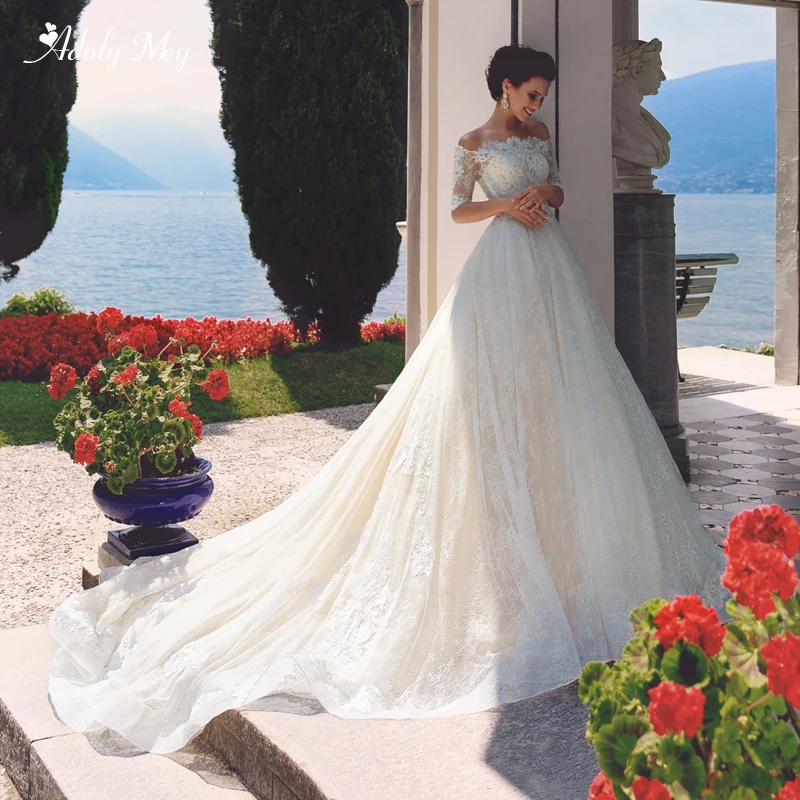 Adoly Mey Romantic Boat Neck Half Sleeve Lace A-Line Wedding Dress 2020 Luxury Beaded Appliques Court Train Princess Bride Gown
Adoly Mey Romantic Boat Neck Half Sleeve Lace A-Line Wedding Dress 2020 Luxury Beaded Appliques Court Train Princess Bride Gown