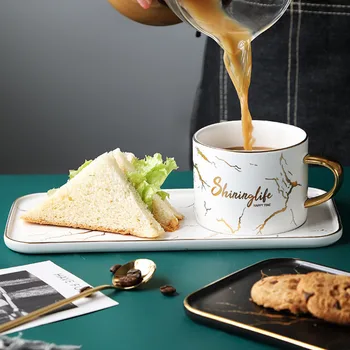 Creative Coffee Cup and Saucer Set Ceramic Breakfast Milk Cup Afternoon Tea Cup European Simple Style Water Cafe Cup with Handle
Creative Coffee Cup and Saucer Set Ceramic Breakfast Milk Cup Afternoon Tea Cup European Simple Style Water Cafe Cup with Handle