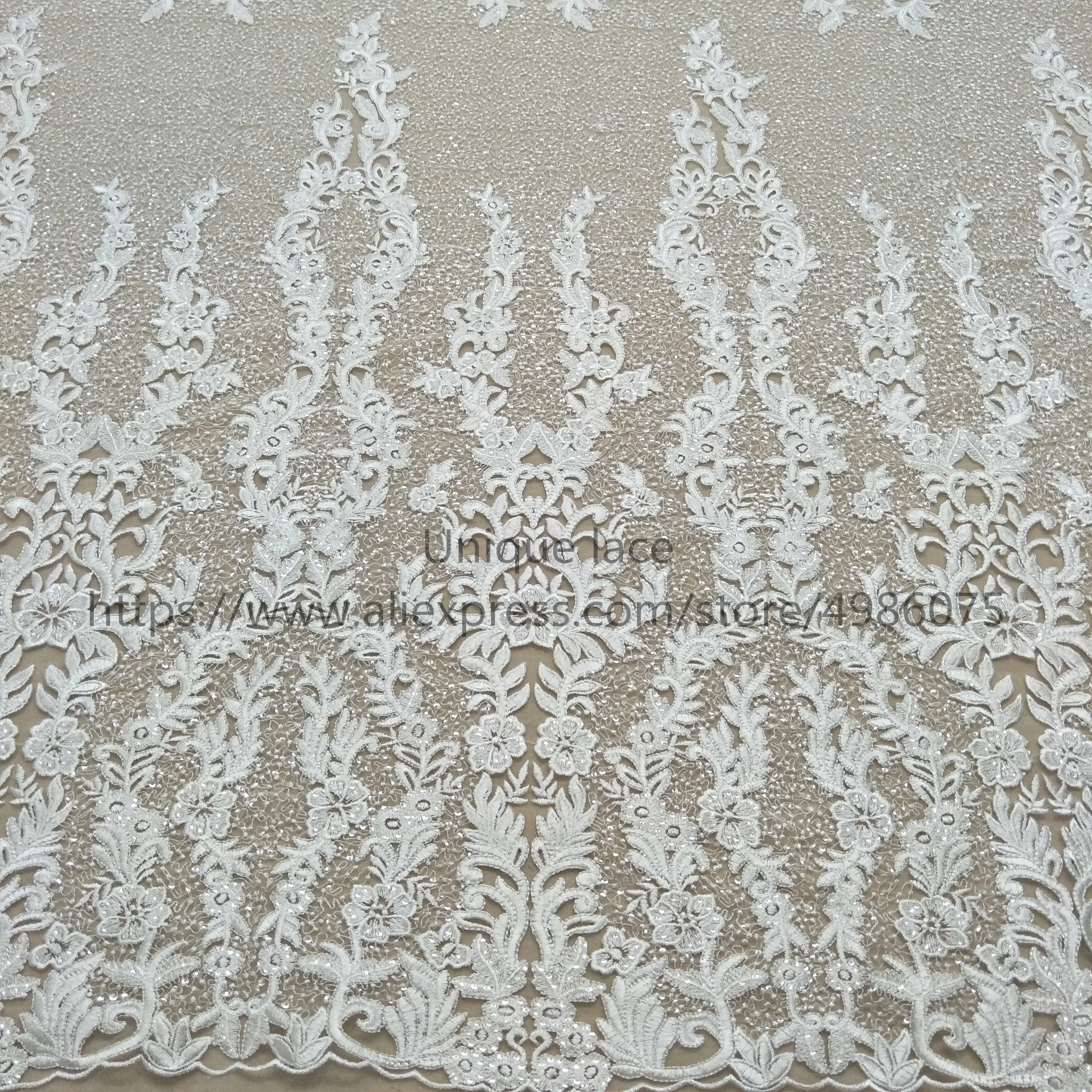 Higher bridal dress lace fabric ivory wedding dress 130cm width embroidery guipure lace 
Higher bridal dress lace fabric ivory wedding dress 130cm width embroidery guipure lace