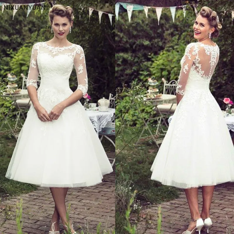 Scoop Neckline Half Sleeves Mid-Calf Wedding Dress with Lace Applique A-line Illusion Tulle Button Back Bridal Dress
Scoop Neckline Half Sleeves Mid-Calf Wedding Dress with Lace Applique A-line Illusion Tulle Button Back Bridal Dress