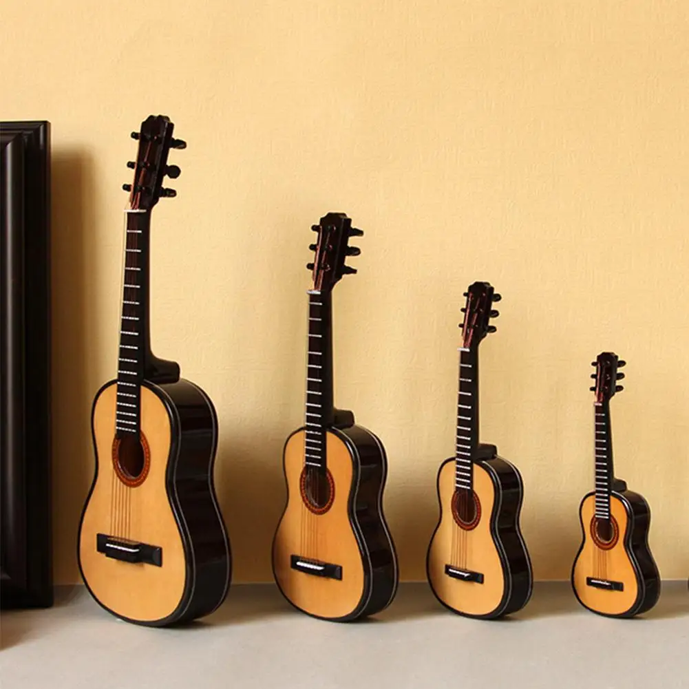 Mini Classical Guitar Miniature Model Wooden Mini Musical Instrument Model Table Decoration Ornament with Case Bracket Stand
Mini Classical Guitar Miniature Model Wooden Mini Musical Instrument Model Table Decoration Ornament with Case Bracket Stand