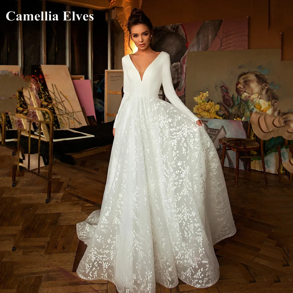 Фото Женское атласное свадебное платье-трапеция элегантное привлекательное белое