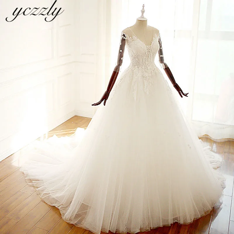 Vestidos De Novia Talla Grande Elegant V-neck Ball Gown Puffy Lace Appliques Pearls Wedding Dress With 3/4 Sleeves Boda W103
Vestidos De Novia Talla Grande Elegant V-neck Ball Gown Puffy Lace Appliques Pearls Wedding Dress With 3/4 Sleeves Boda W103