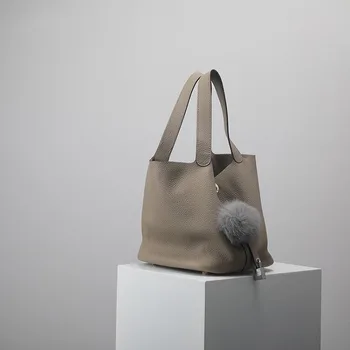 Autumn and Winter Basket Handbag Leather Women's Bag Head Layer Litchi Grain Kraft Bucket Bag 
Autumn and Winter Basket Handbag Leather Women's Bag Head Layer Litchi Grain Kraft Bucket Bag