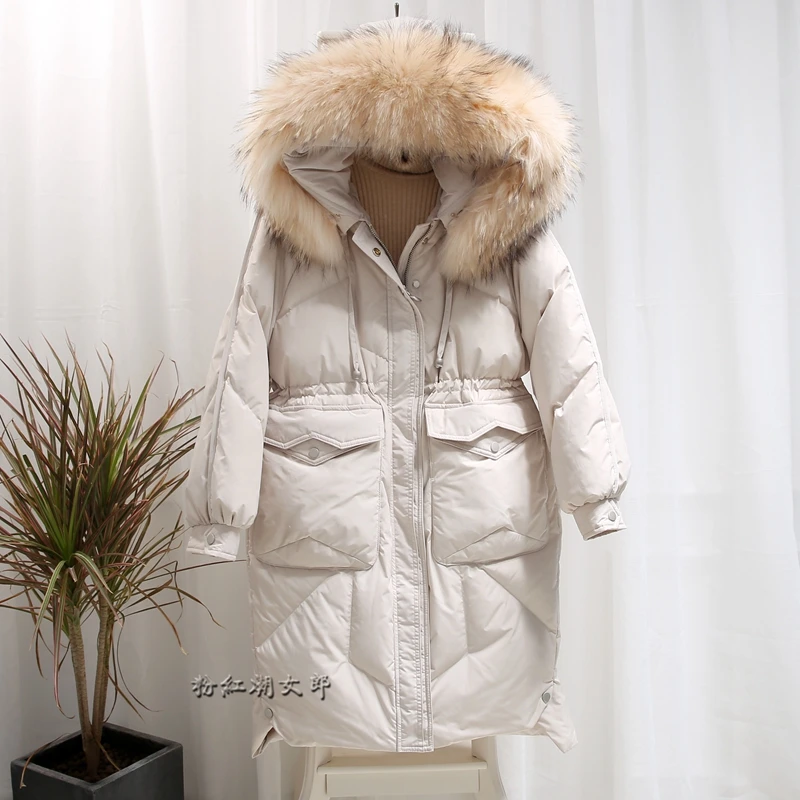 Женская Длинная зимняя куртка с капюшоном большим воротником из меха енота