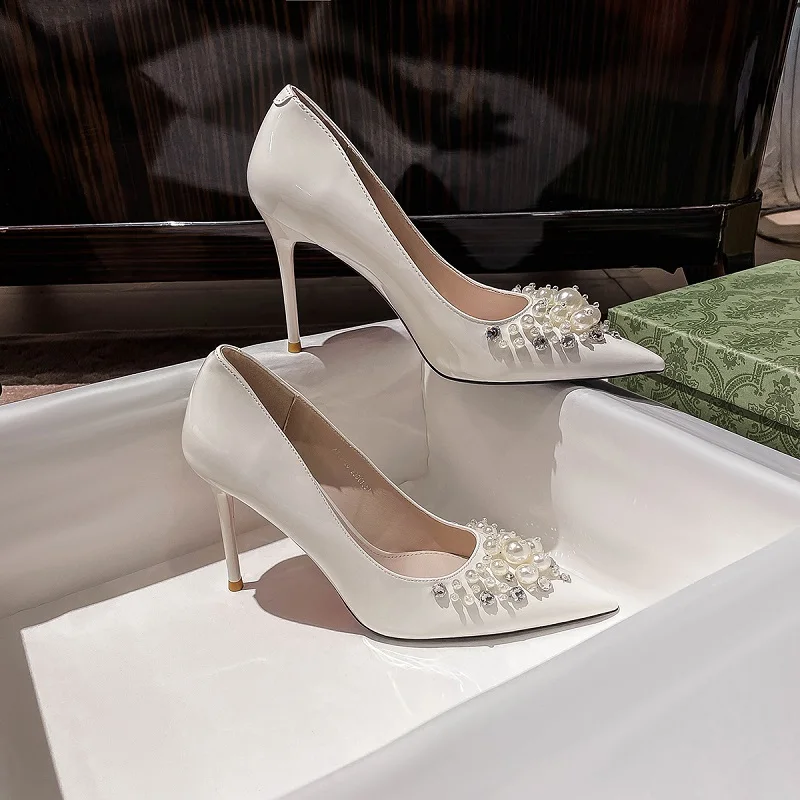 Spring big pearl suede patent leather pointed shallow mouth high heel womens single shoes banquet dress wild bridal wedding shoe
Spring big pearl suede patent leather pointed shallow mouth high heel womens single shoes banquet dress wild bridal wedding shoe