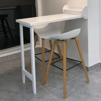The Bar Table Is Folded with A High Stool and The Wall Is Hung Against The Wall. The Bar Table and The Chair Are Attached
The Bar Table Is Folded with A High Stool and The Wall Is Hung Against The Wall. The Bar Table and The Chair Are Attached