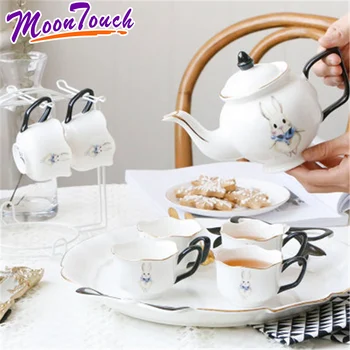 British Tea Cup Set Six Coffee Mug and Pot with Saucer Ceramic Family Water Kettle with Six Spoon Cartoon Teapot
British Tea Cup Set Six Coffee Mug and Pot with Saucer Ceramic Family Water Kettle with Six Spoon Cartoon Teapot